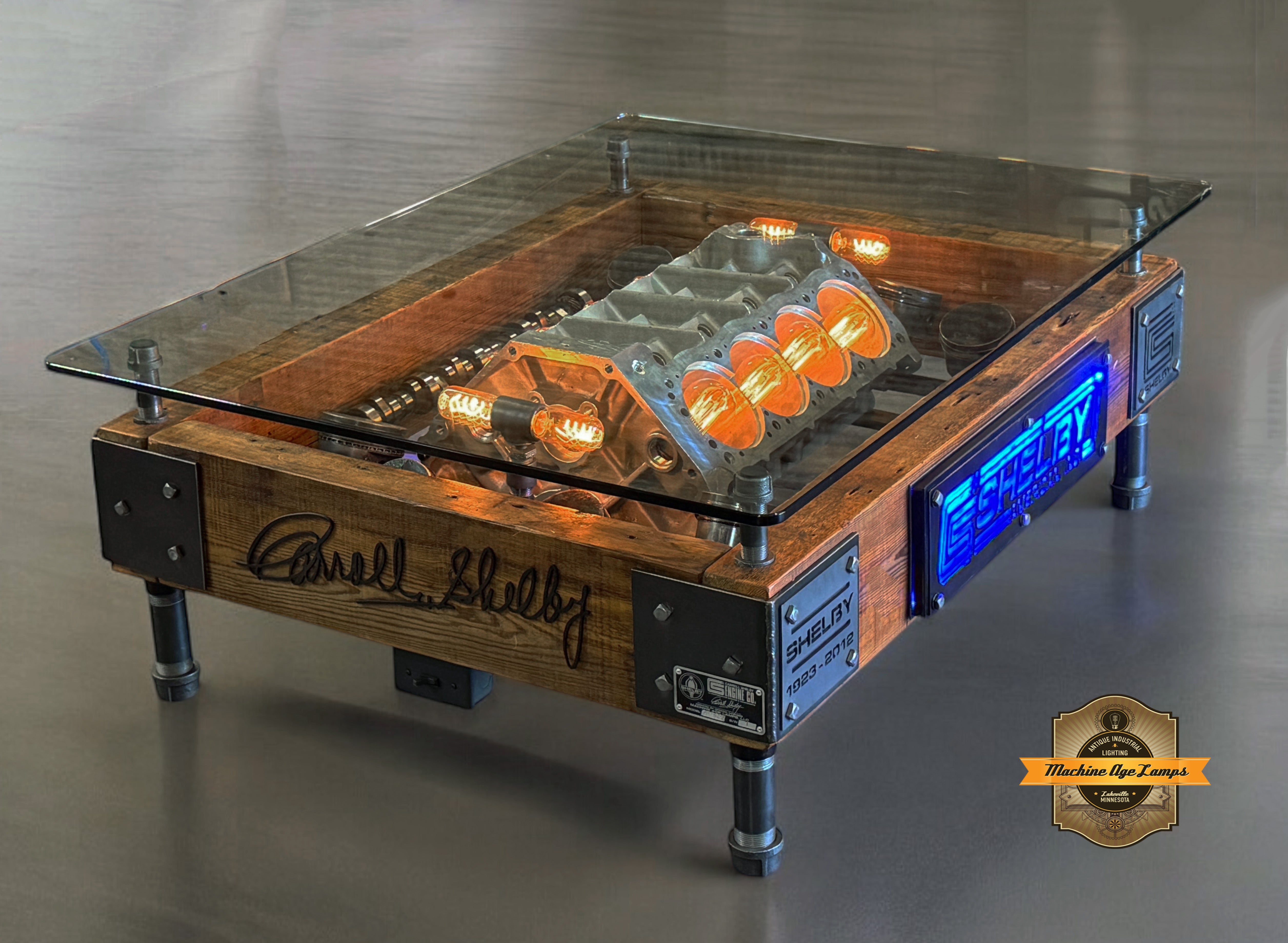 Steampunk industrial coffee table made from a Carroll Shelby 289 engine block and barnwood.