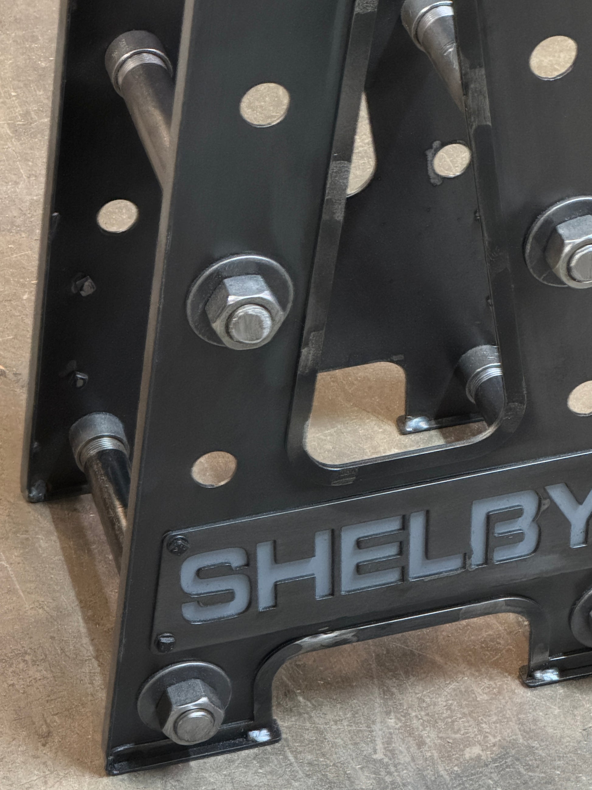 close up of logo on Industrial steampunk Carrol Shelby Barstool