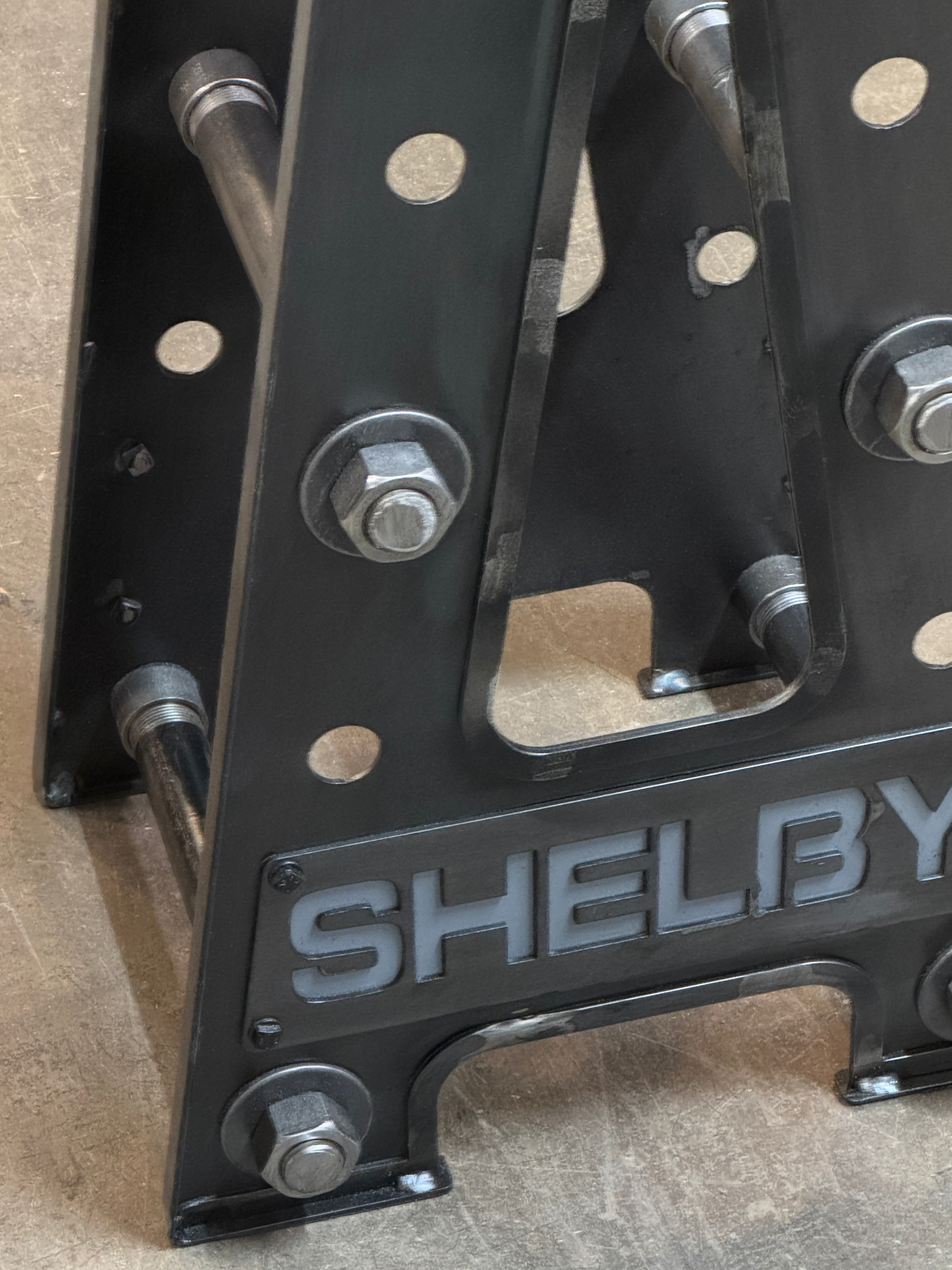 close up of logo on Industrial steampunk Carrol Shelby Barstool